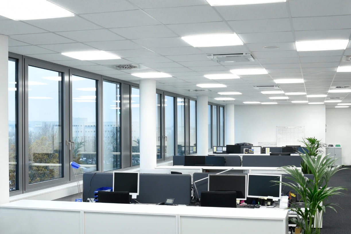 An open-plan office lit by efficient LED lighting